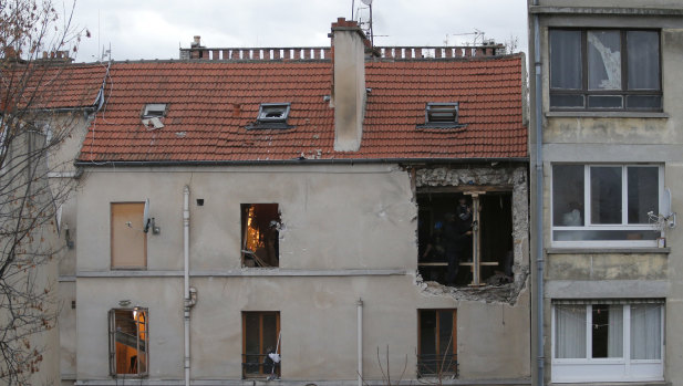 The building of the police raid on an apartment is pictured in Paris suburb Saint-Denis. 
