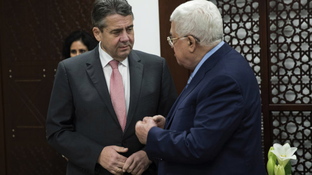 German Foreign Minister Sigmar Gabriel, left, meets with the Palestinian President Mahmoud Abbas, in the West Bank Town of Ramallah.