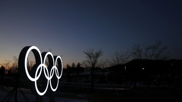 Olympic rings shine at dusk at the Alpensia resort, PyeongChang.
