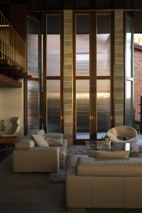 The panelled glass doors at the home provide privacy from neighbours.