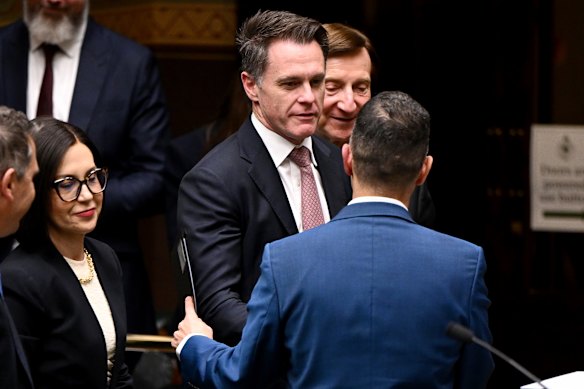 NSW Premier Chris Minns (left) pictured congratulating NSW Treasurer Daniel Mookhey on his delivery of the 2026-27 budget.