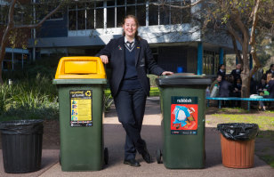 Putting the bins out: year 11 student Lucy Skelton.