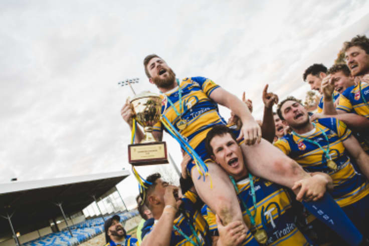 Rams captain Jeffrey Morgan with the premiership cup.