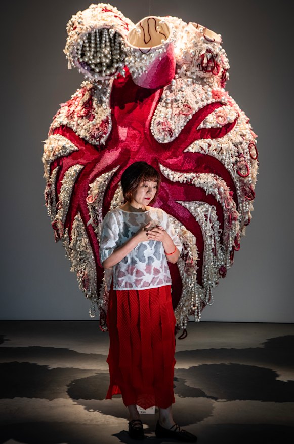 Ema Shin with her work Hearts of Absent Women (Tree of Family).