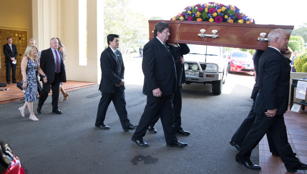 Pallbearers carry Matthew Leveson's casket at his funeral on Friday.