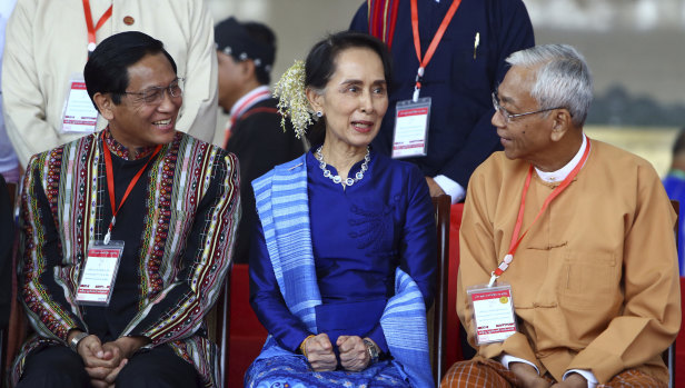 Myanmar's de facto leader Aung San Suu Kyi, with President Htin Kyaw, right, and Vice President Henry Van Hti Yu, left. 