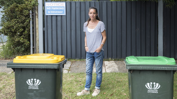 Heidi Williams has resorted to 'no parking' signs and wheelie bins to deter drivers from blocking the driveway of her Willoughby home.
