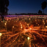 Which Australian landmark will you find near the Field of Light desert art installation?