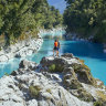 Hokitika Gorge is a sight to behold, with stunning blue waters surrounded by greenery.