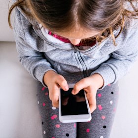 Children under 12 who own a smartphone could face higher health risks. 