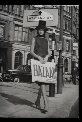 Model holding a Bazaar Carrier Bag
1959. 
