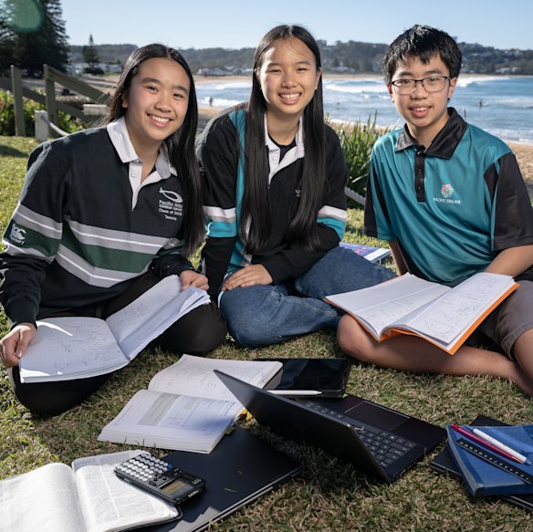 Accelerated studies: Tammie (left), with Rebecca and Josh Liew, says that “we all go to the library and study together. Our desks at home are next to each other”.  