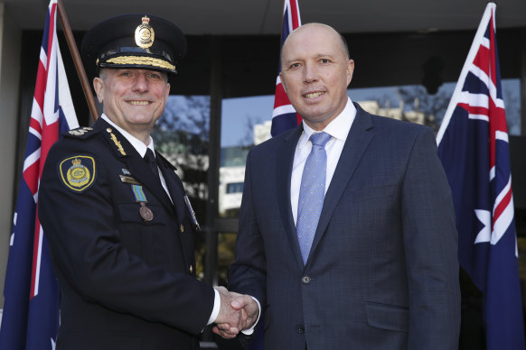 Home Affairs Minister Peter Dutton and Australian Border Force Commissioner Michael Outram at Mr Outram's swearing-in ceremony in May 2018.