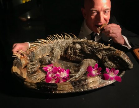 Jeff Bezos tries the roasted iguana appetisers at the 2018 Explorers Club Annual Dinner, where he accepted the Buzz Aldrin Space Exploration Award. 