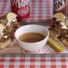 The French dip bagel comes with a bowl of broth for dipping into.