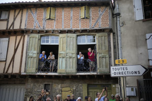 Spectators wait for the riders to pass during the 14th stage of this year’s Tour de France between Carcassonne and Quillan in the south of France.