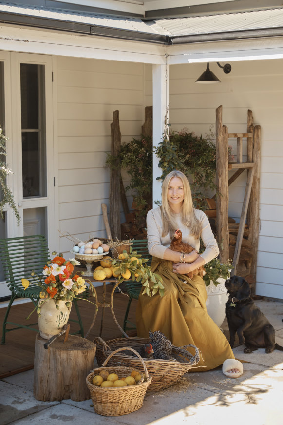 Collette wears H Brand knit from The South Store, Chez Dédé skirt, Country Road slides and Fairley jewellery.