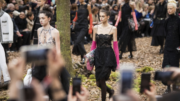Chanel staged its show in a faux forest inside a marquee.