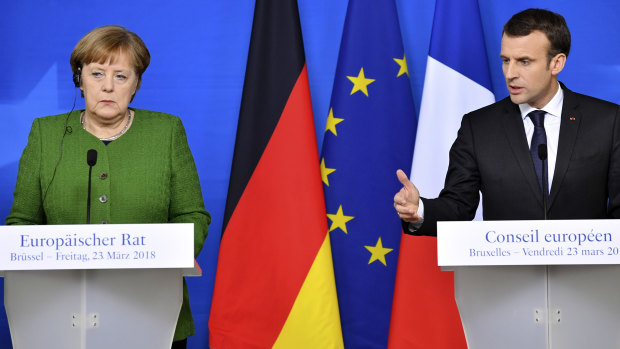 French President Emmanuel Macron and German Chancellor Angela Merkel at the EU summit in Brussels.