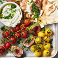 Blistered tomato, fig and crispy pita with herb dressing. 