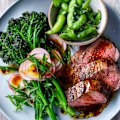 Soy-marinated steak with broccolini and edamame salad.