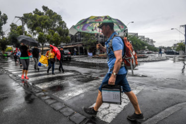 Umbrellas were the accessory of choice across the state on Thursday.