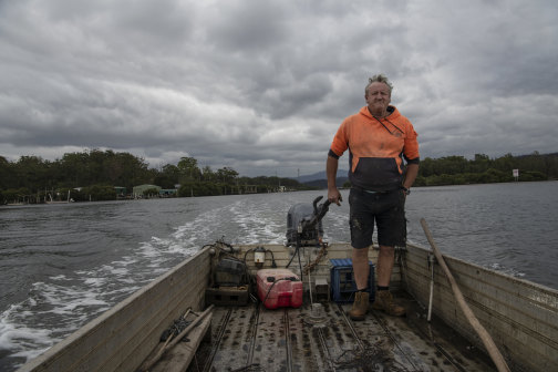 Oyster farmer Rick Christensen on his way up the Clyde River.
