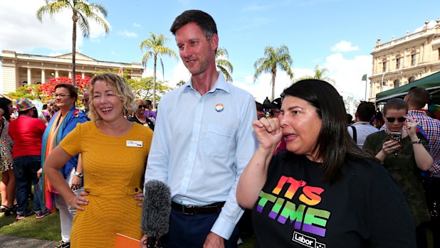 Queensland Main Roads Minister Mark Bailey (centre).