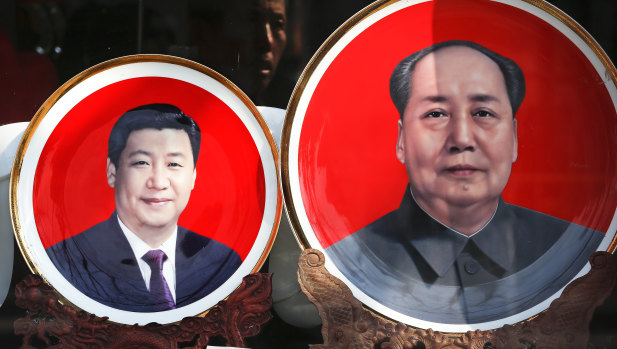 Souvenir plates bearing images of Chinese President Xi Jinping, and late Chinese leader Mao Zedong.