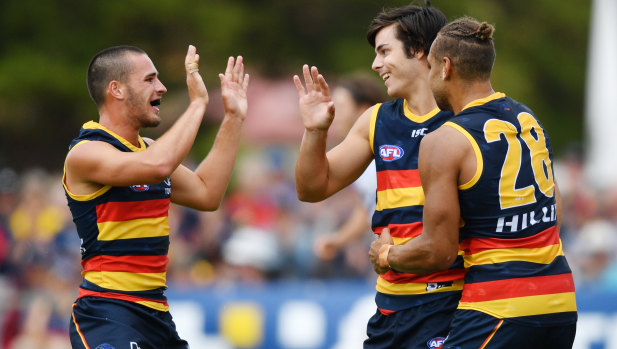 Matt Crouch and Darcy Fogarty celebrate a goal in the pre-season.