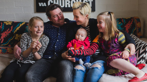 Daisy, Rob, Beth (holding baby Maggie) and Harper Macdonald at their home in Burrawang. The parents and older girls moved from Sydney to the Southern Highlands in 2010. 