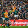 Australia’s Dylan Pietsch, top left, jumps for the ball during the match against the Springboks.