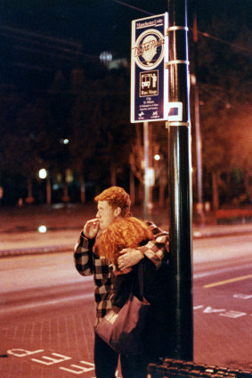 Paul Maxwell and Sally Finch wait for a bus.