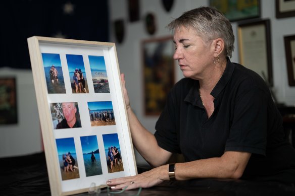 Raelene Millington with pictures of her murdered brother. 