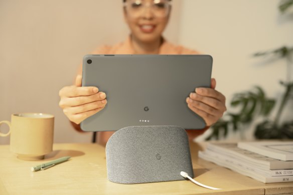 The Pixel Tablet attaches magentically to its charging dock for use as a smart home hub.