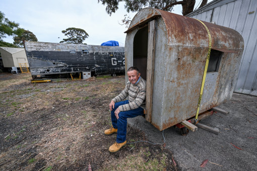 Gimme shelter: Rodney Binns at Moorabbin Air Museum with the air raid shelter he donated.