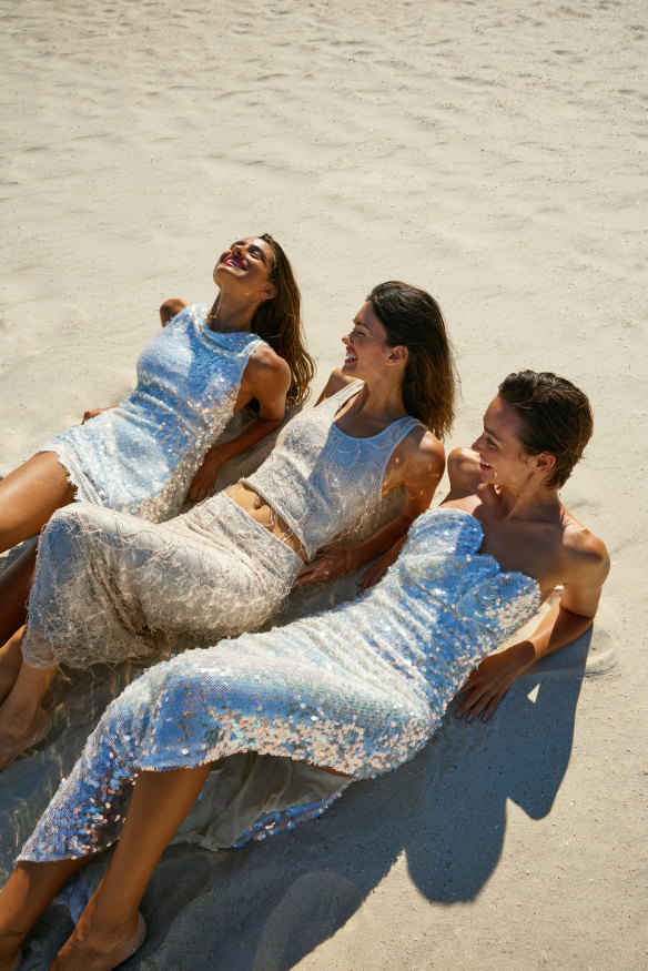 From left: Noemi wears Christopher Esber “Opaline” minidress, $1200. Sofia wears Christopher Esber “Lucent” separation gown, $1650. Mia wears Christopher Esber “Opaline” strapless gown, $1250.