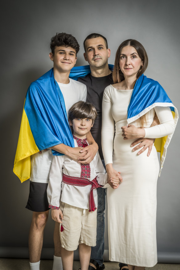 Natalia Boychyn with husband Petro and their two sons.