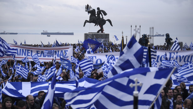 Greek protesters wave flags and banners during a rally against the use of the term "Macedonia" for the northern neighbouring country's name, at the northern Greek city of Thessaloniki on Sunday.