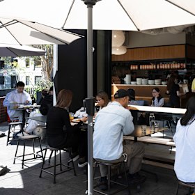 The cafe has seating inside and out.