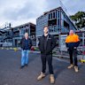 Aaron Lanfranchi with fellow tradesman Chris Richardson and Anthony Richardson at the Coburg High School worksite. 
