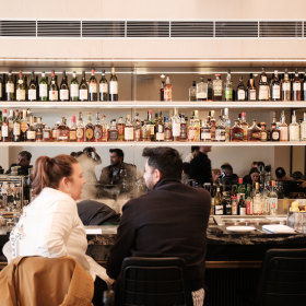 The bar is made from one thick slab of stone.