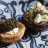 Blue swimmer crab egg tart (right) and cauliflower egg tart with caviar.