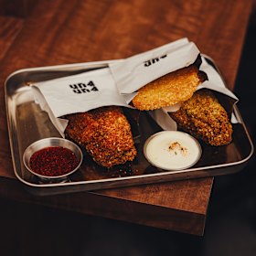 Sesame fried chicken and hash brown. 