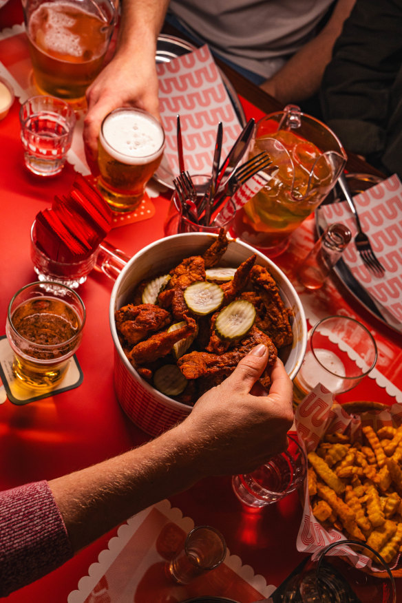 An endless bucket of hot wings at Belles.