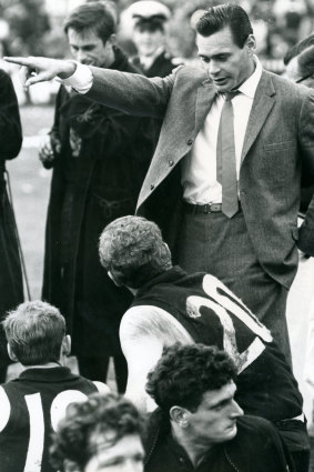 Ron Barassi gives directions to Wes Lofts.