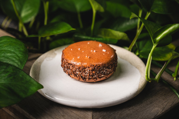Josh Niland’s Valrhona chocolate macaron features ice-cream made with fish eyes.