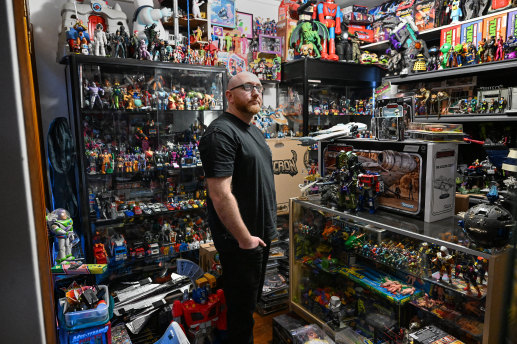 Beven Davey at home in Geelong with some of his huge toy collection.