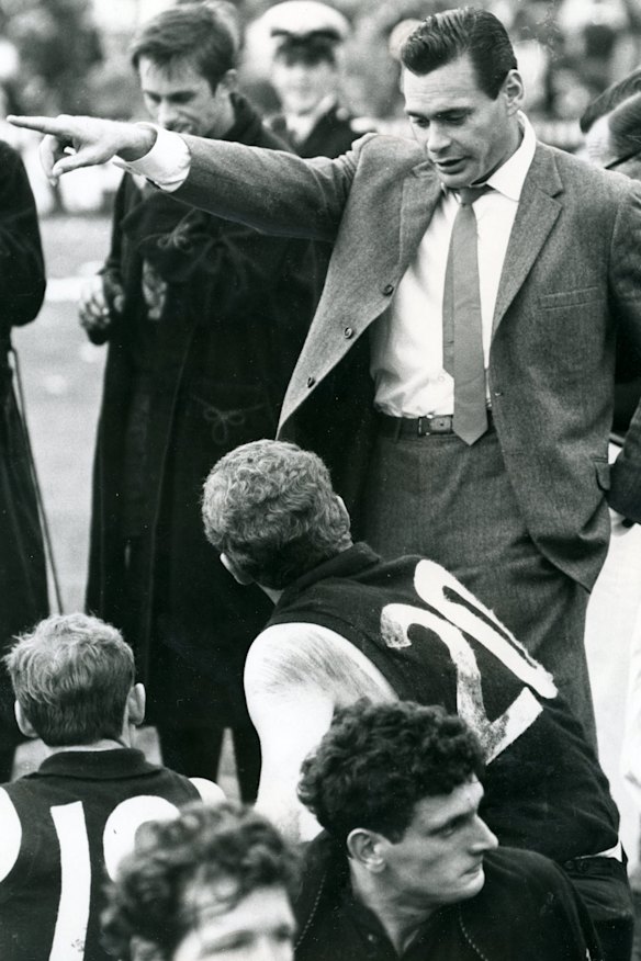 Ron Barassi gives directions to Wes Lofts.