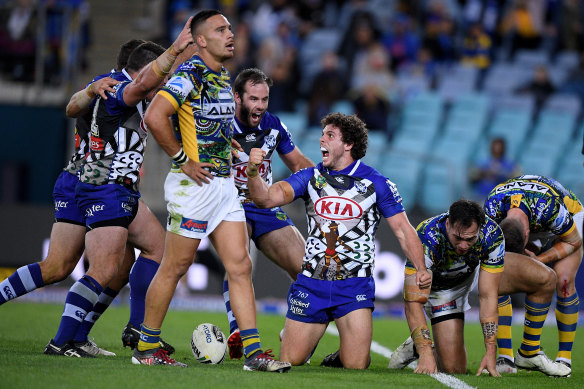 On the spot: Adam Elliott   celebrates after scoring the matchwinning try against the Eels.